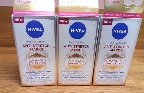 Three new nivea body oil - three,